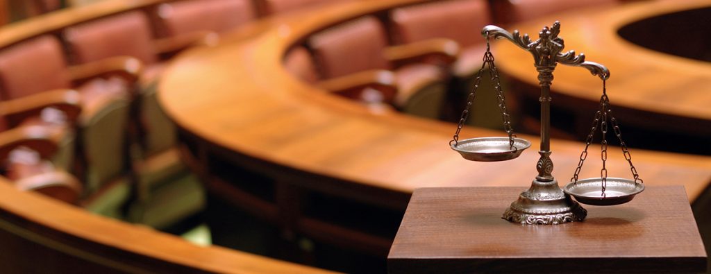 child protection reform. Scales in courtroom